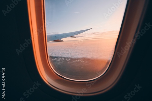 Beautiful sunset look through airplane window