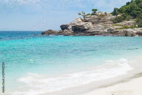 Ocean shore, turquoise water and sand