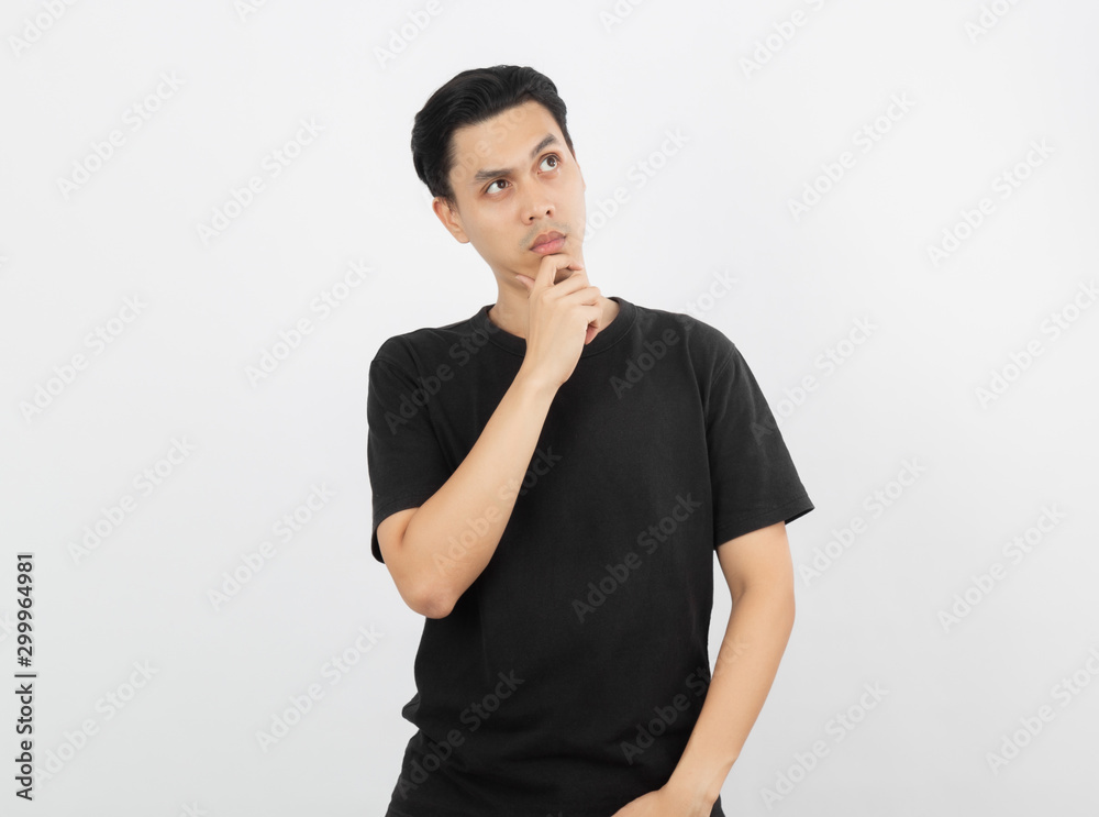 Young handsome asian man thinking an idea while looking up isolated on white background. Young handsome asian man thinking an idea while looking up isolated on white background.