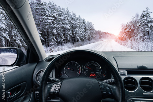 The car moves on a winter road