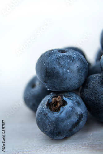 Blueberries on a white table, shallow depth of field, macro