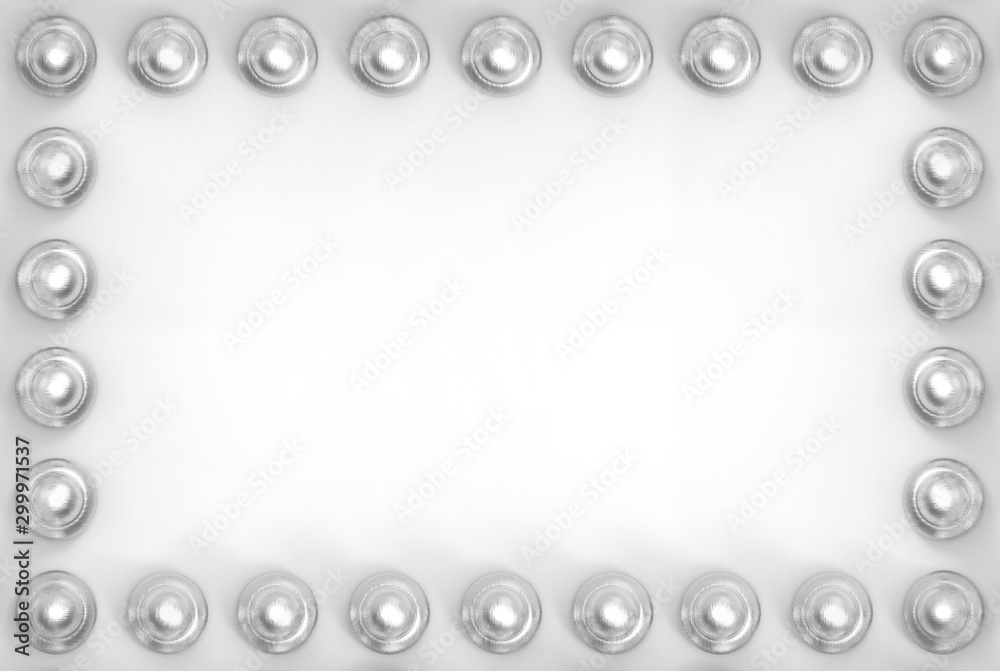 3d rendering. Silver circular button on gray board wall background. 3d rendering. Silver circular button on gray board wall background.