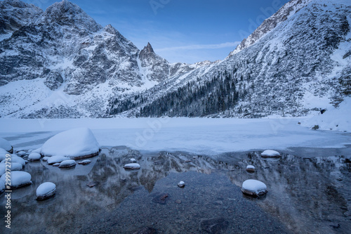 Morskie Oko in winter sunrise in Tatra Mountains in Poland