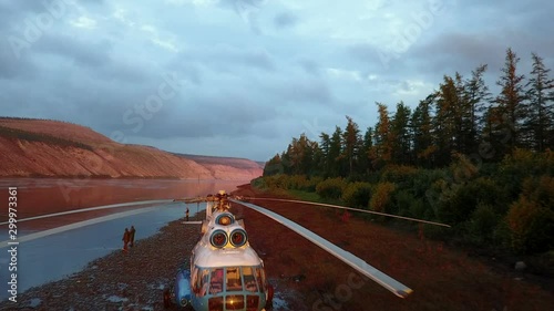 aerial view of the Putorana plateau helicopter on the river Bank of the Kotuy