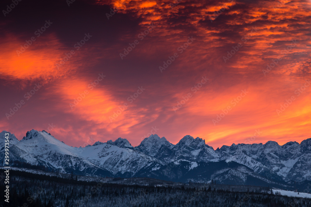Amazing sunset in Lapszanka with a view to Tatra Mountains in Poland 