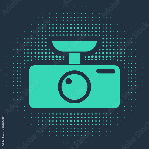 Green Car DVR icon isolated on blue background. Car digital video recorder icon. Abstract circle random dots. Vector Illustration