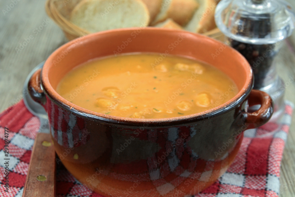 bowl of soup with vegetables and croutons bowl of soup with vegetables and croutons