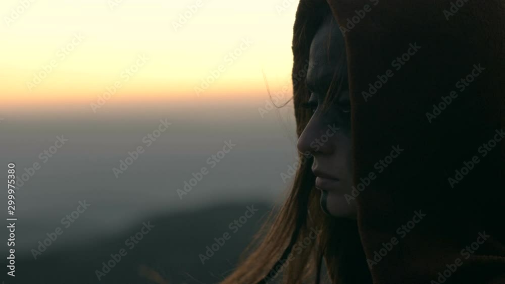 Dark age woman in a cape