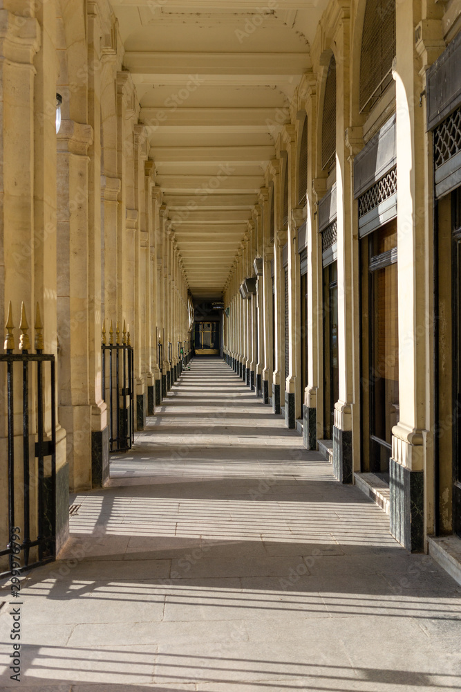 Column corridor in Palais Royal, Paris. France. 
