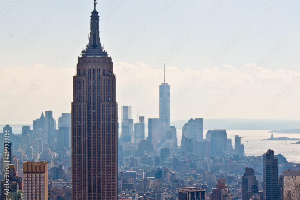 Fototapeta premium New - York Manhattan city view with skyscrapers and blue sky 