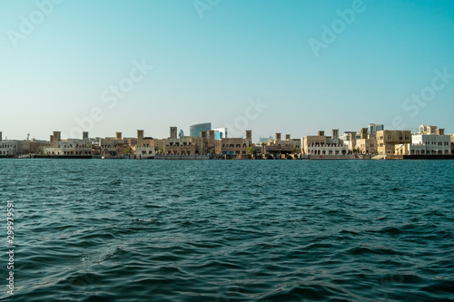 Boat marina on the canal in the middle of the city. View of Dubai Creek from the Deira area.  © Андрей Афимьин