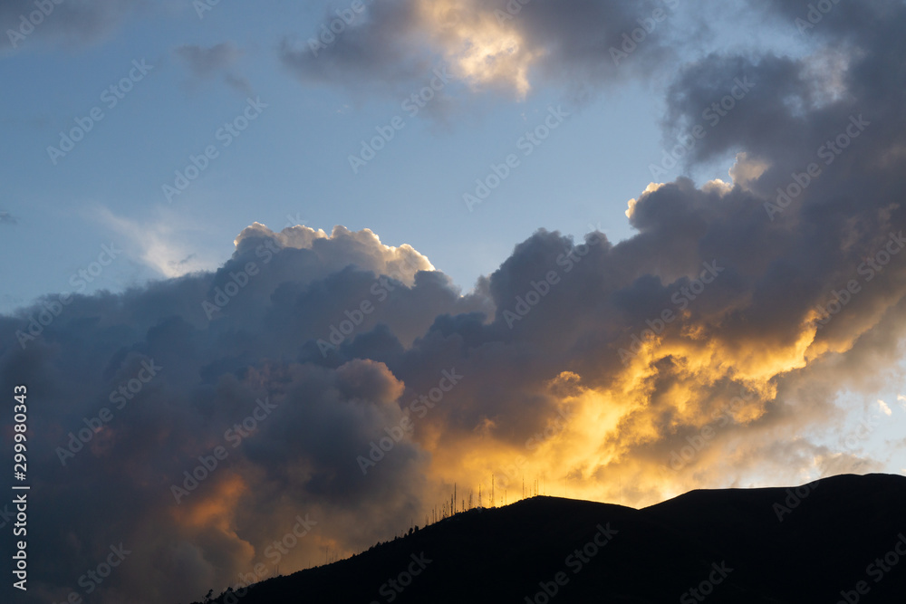 Sunset, cloudscape and mountain
