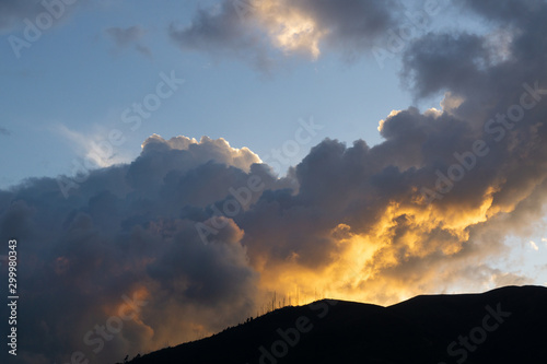 Sunset, cloudscape and mountain