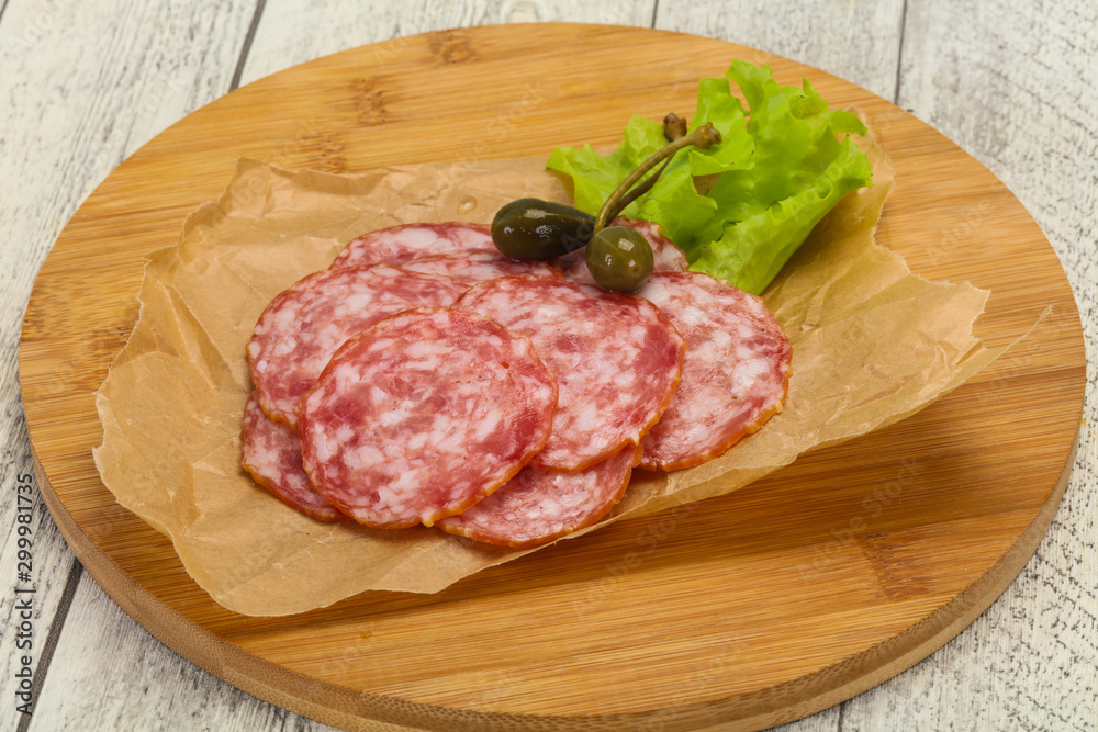 Spanish Salchichon sausage with salad Spanish Salchichon sausage with salad