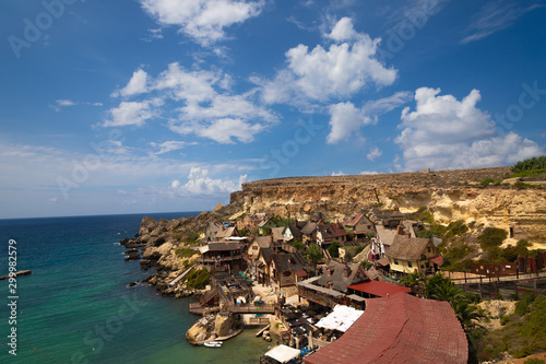 Il-Mellieha, Malta - September 5, 2019: Colorful Popeye Village view. The Popeye Village at Achor Bay is the most popular Tourist attraction in Malta. photo