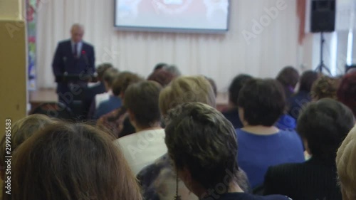Wallpaper Mural People at the business development forum. View from the back of the auditorium with people at a conference or presentation. Torontodigital.ca