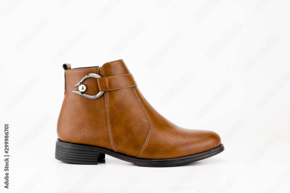Elegant woman brown leather boots