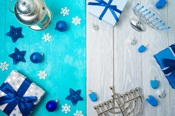 Christmas and Hanukkah celebration concept. Winter holidays background with gift boxes and traditional decorations.