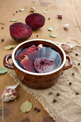 Beet sourdough in a stoneware dish photo