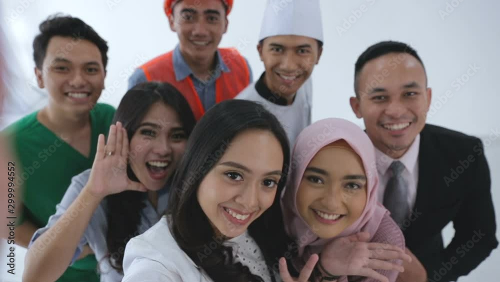Group of happy people in difference occupation taking selfie together Group of happy people in difference occupation taking selfie together