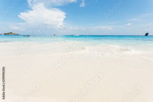 Sea view from tropical beach with sunny sky