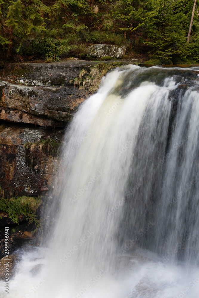 Fototapeta premium Jedlove Falls in super green forest surroundings, Czech Republic