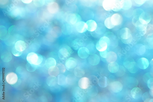 blur glitter, bokeh, defocused blue festive background, texture. Xmas abstract background .