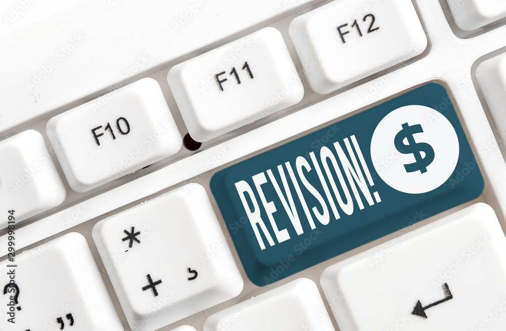 Word writing text Revision. Business photo showcasing action of revising over someone like auditing or accounting White pc keyboard with empty note paper above white background key copy space Word writing text Revision. Business photo showcasing action of revising over someone like auditing or accounting White pc keyboard with empty note paper above white background key copy space