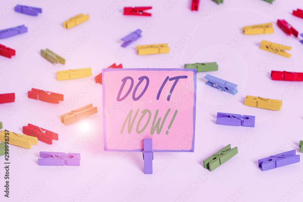 Text sign showing Do It Now. Business photo text not hesitate and start working or doing stuff right away Colored clothespin papers empty reminder white floor background office Text sign showing Do It Now. Business photo text not hesitate and start working or doing stuff right away Colored clothespin papers empty reminder white floor background office