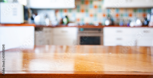 blurred kitchen interior with napkin on table