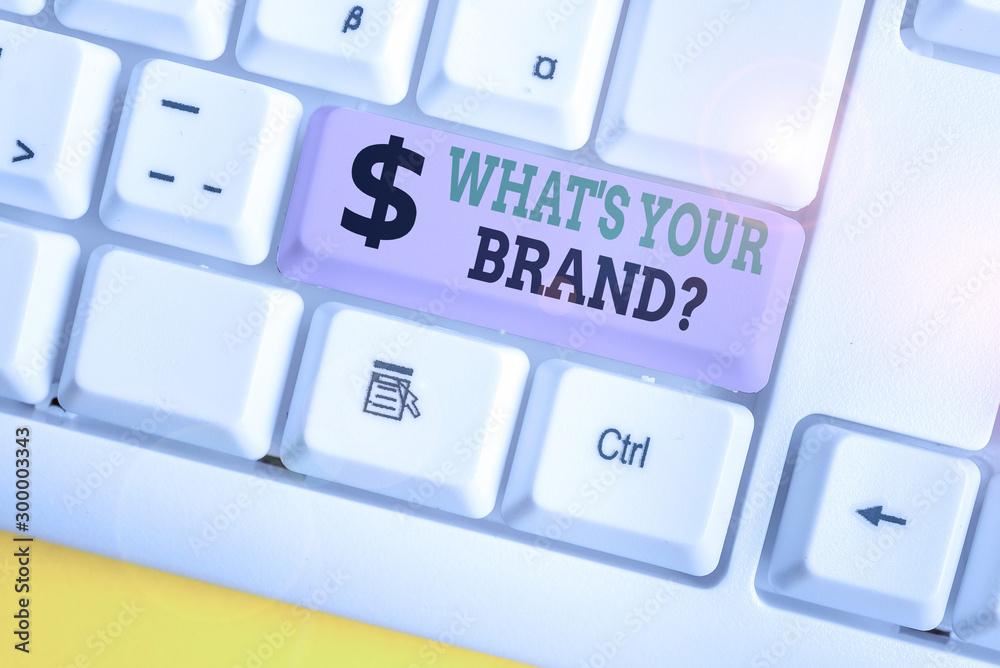 Conceptual hand writing showing What S Your Brand Question. Concept meaning asking about product logo does or what you communicate White pc keyboard with note paper above the white background Conceptual hand writing showing What S Your Brand Question. Concept meaning asking about product logo does or what you communicate White pc keyboard with note paper above the white background
