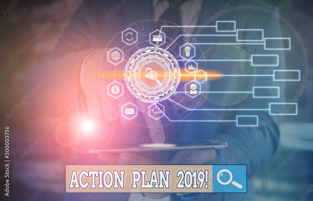 Conceptual hand writing showing Action Plan 2019. Concept meaning proposed strategy or course of actions for current year Picture photo network scheme with modern smart device Conceptual hand writing showing Action Plan 2019. Concept meaning proposed strategy or course of actions for current year Picture photo network scheme with modern smart device