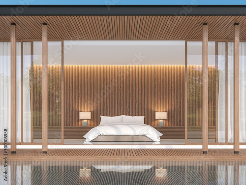Fototapeta Naklejka Na Ścianę i Meble -  Bedroom in modern contemporary style 3d render,The walls are decorated with wood. Decorated with white beds The front of the room has a wooden balcony and a black tile swimming pool.
