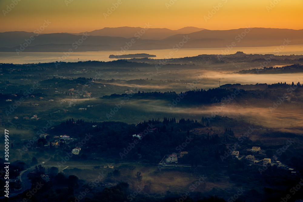 Obraz premium Dawn over of Corfu island in the Ionian Sea