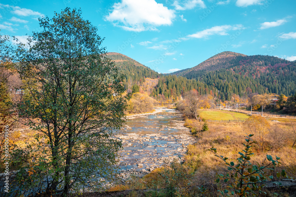 Mountain river on an autumn sunny day Mountain river on an autumn sunny day