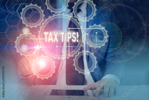 Text sign showing Tax Tips. Business photo showcasing compulsory contribution to state revenue levied by government Picture photo system network scheme modern technology smart device