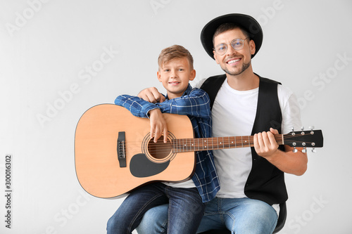 Handsome man and his little...