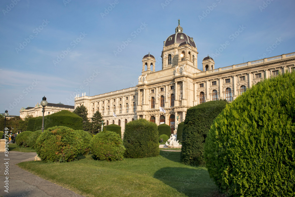 Beautiful view of world famous Naturhistorisches or Natural History Museum, with park on the Ring strasse. Exterior view from Maria Theresa Square