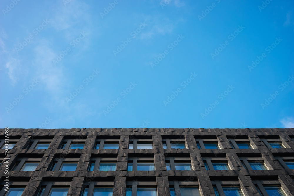 Obraz premium modern office building in stockholm with a blue sky