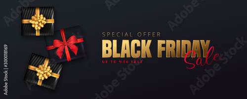 50% discount offer for Black friday sale lettering, Black gift boxes around on black background. Can be used as poster,banner or template design.