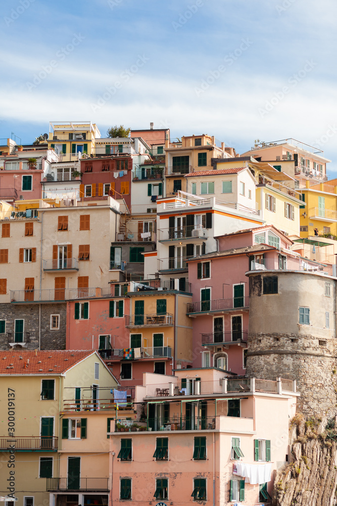Italy, Liguria region, Cinque Terre national resort - dream destination for tourists. Colorful houses, bright blue sky. Summer, vacations time.