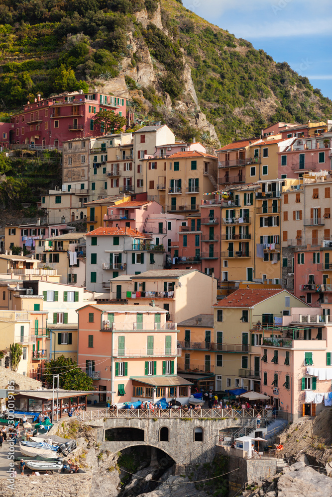 Italy, Liguria region, Cinque Terre national resort - dream destination for tourists. Colorful houses, bright blue sky. Summer, vacations time.