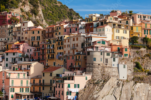 Italy, Liguria region, Cinque Terre national resort - dream destination for tourists. Colorful houses, bright blue sky. Summer, vacations time.