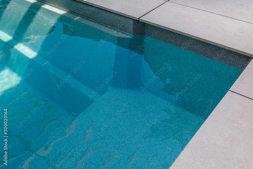 Part of the pool close-up, abstract geometry of the pool, fragments and details of the pool, pool bowl, top view, shape, lines.