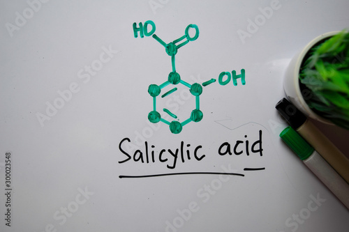 Salicylic acid molecule write on the white board. Structural chemical formula. Education concept photo