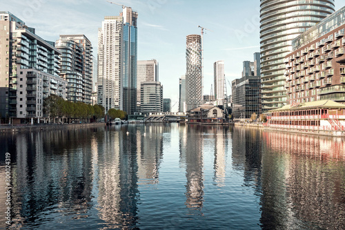 Cityscape of modern buildings at Millwall inner dock in Canary Wharf photo