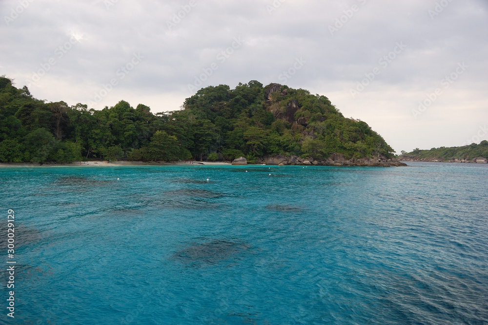 The blue evening waters of the Similan Islands in Thailand