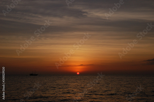 A sunset in the Similan Islands in Thailand © Olga