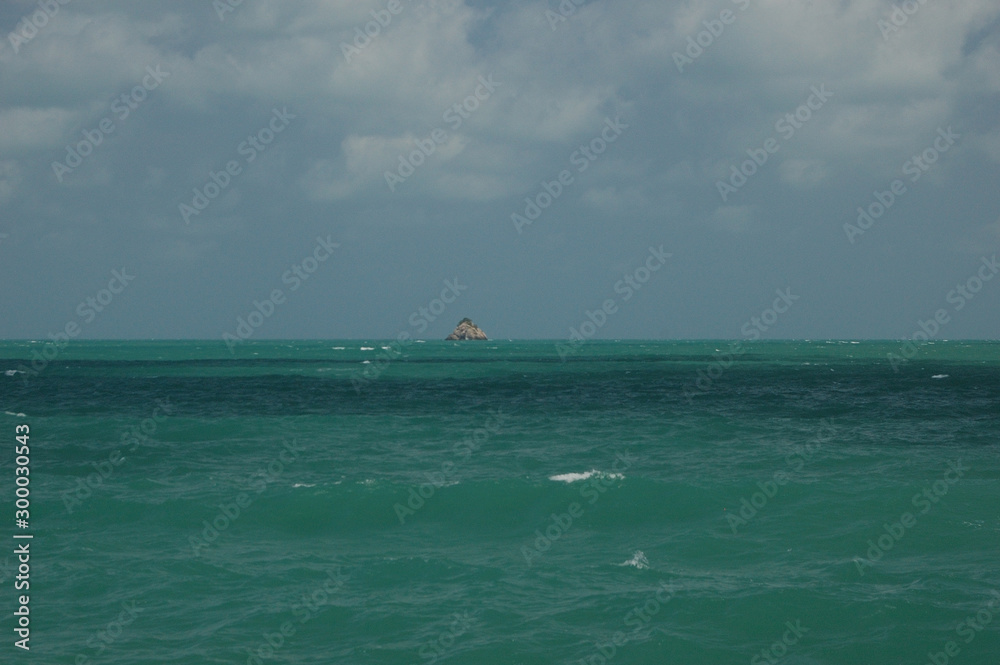 The sea and a small island between Koh Samui and Koh Phangan in Thailand