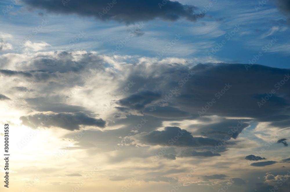 Heavy clouds on blue sky